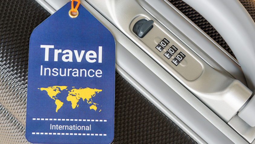 Traveller preparing for a trip with travel insurance, passport, tickets and travel vaccinations